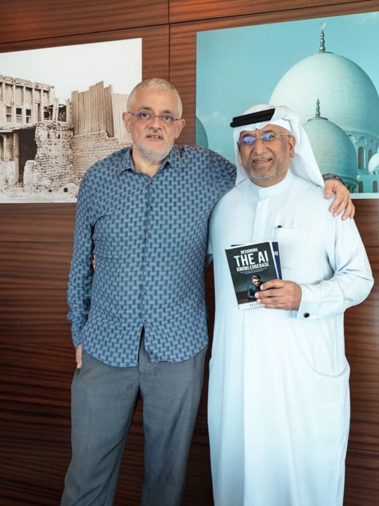A Special Moment: Presenting My Books to Mr. Abdullatif Al Mulla